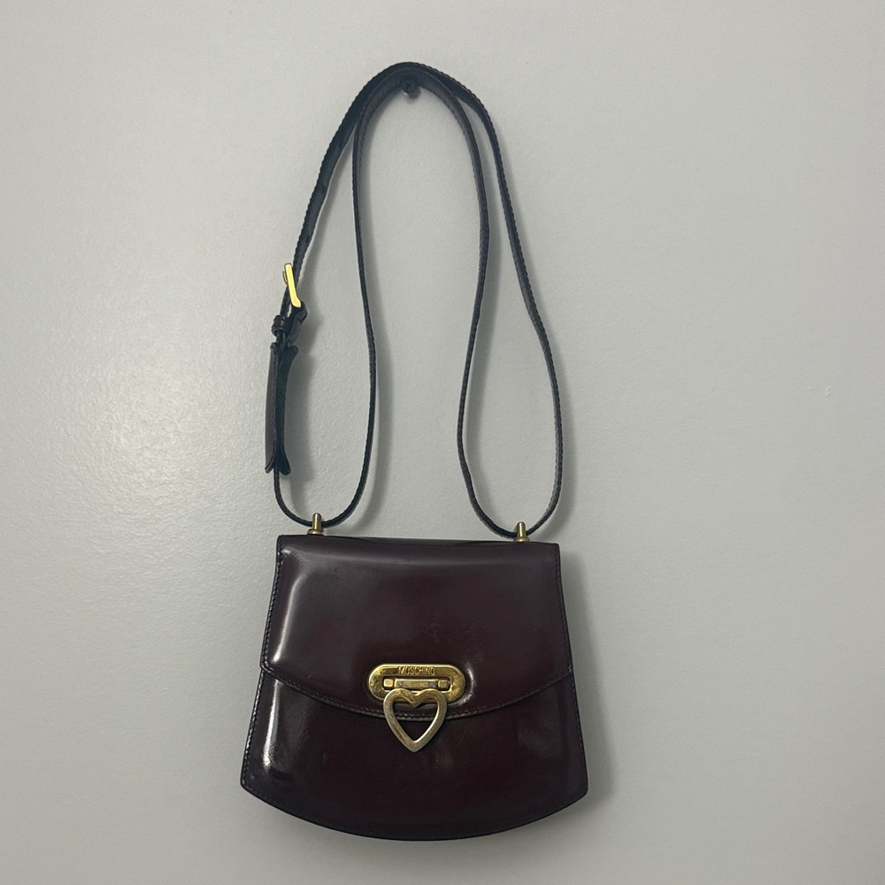 Stylish Maroon Crossbody Bag with Heart Clasp